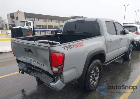 2018 Toyota Tacoma Trd Off Road z USA, uszkodzony, nr VIN 3TMCZ5AN0JM183957